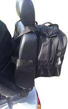 Load image into Gallery viewer, Black large shopping and luggage bag attached to the back of a mobility scooter seat using adjustable straps