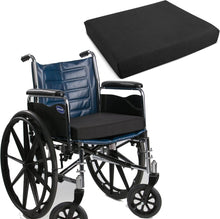 Load image into Gallery viewer, Orthopaedic foam wheelchair cushion in black positioned on a standard wheelchair, designed for comfort and pressure distribution.