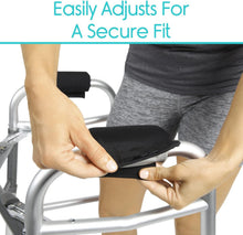 Load image into Gallery viewer, Walker grip cushion pads attached to a rollator handle, highlighting universal compatibility and enhanced comfort for seniors and individuals requiring walking assistance.