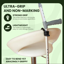 Load image into Gallery viewer, Walking stick holder wrapped around cane and chair showing strong grip and lightweight design