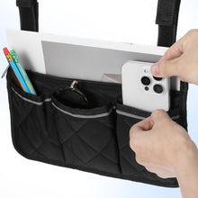 Load image into Gallery viewer, Wheelchair storage bag hanging on the back, offering organized space for phone, keys, and daily essentials
