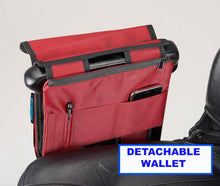 Load image into Gallery viewer, Red mobility scooter pannier bag with detachable wallet attached to armrest.