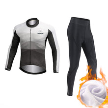 Load image into Gallery viewer, Men’s winter cycling outfit by CushBike – black fleece-lined jersey and tights, moisture‑wicking, thermal cycling gear for winter weather.