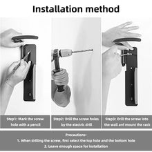 Load image into Gallery viewer, CushBike wall-mounted bike rack with 360° swivel – vertical hanger keeps bikes off the floor, saves space, organizes your garage, and provides quick, easy access for everyday use.