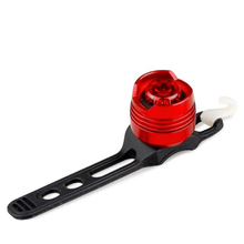 Load image into Gallery viewer, CushBike 300‑Lumen rechargeable bicycle tail light mounted on a seatpost — bright LED, waterproof aluminium body, quick‑release strap for bike, helmet or backpack