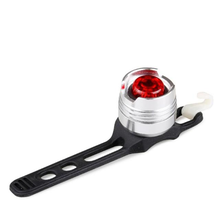 Load image into Gallery viewer, CushBike 300‑Lumen rechargeable bicycle tail light mounted on a seatpost — bright LED, waterproof aluminium body, quick‑release strap for bike, helmet or backpack