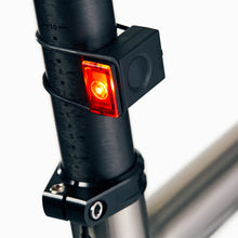 Load image into Gallery viewer, Bookman Block Light Rear Black mounted on a bicycle

