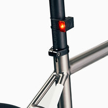 Load image into Gallery viewer, Close-up of Bookman Block Light Rear Black bicycle light
