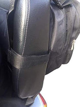 Load image into Gallery viewer, Close-up of a black mobility scooter luggage bag securely fastened to the seat back using adjustable strap and buckle
