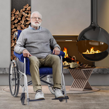 Load image into Gallery viewer, Close-up of blue wheelchair armrest cushion pad.
