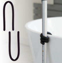 Load image into Gallery viewer, Rubber walking stick holder shown alone and wrapped around cane for secure attachment

