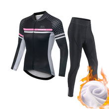 Load image into Gallery viewer, Women’s fleece‑lined cycling set by CushBike — thermal jacket and tights, water‑repellent finish, flexible fit, designed for winter bike rides.
