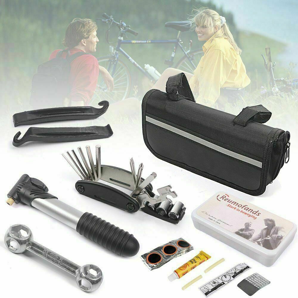 Bike repair tool kit with mini pump, puncture repair kit, hex keys, and tyre levers in a canvas pouch.
