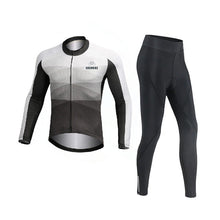 Load image into Gallery viewer, CushBike men’s winter cycling wear – black fleece-lined long‑sleeve jersey made for cold‑weather rides, featuring thermal insulation, full zip, and snug fit for layering.

