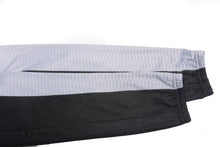 Load image into Gallery viewer, Men’s winter cycling outfit by CushBike – black fleece-lined jersey and tights, moisture‑wicking, thermal cycling gear for winter weather.
