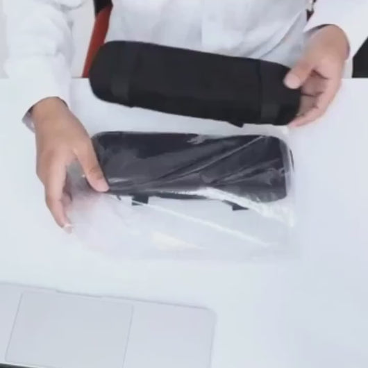 Black memory foam arm pad cover installed on office chair armrest