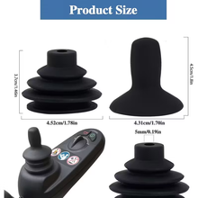 Load image into Gallery viewer, Close-up of black silicone joystick button cap showing flexible material
