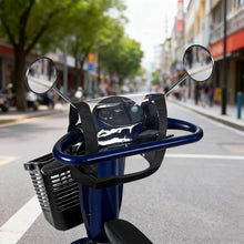 Load image into Gallery viewer, Mobility scooter with clear waterproof control panel cover used on city street
