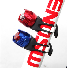 Load image into Gallery viewer, CushBike 300‑Lumen rechargeable bicycle tail light mounted on a seatpost — bright LED, waterproof aluminium body, quick‑release strap for bike, helmet or backpack
